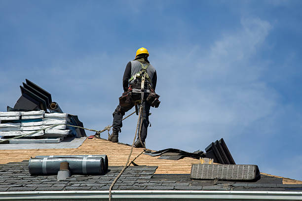 Professional Emergency Roof Repair technician working in Lansing, MI